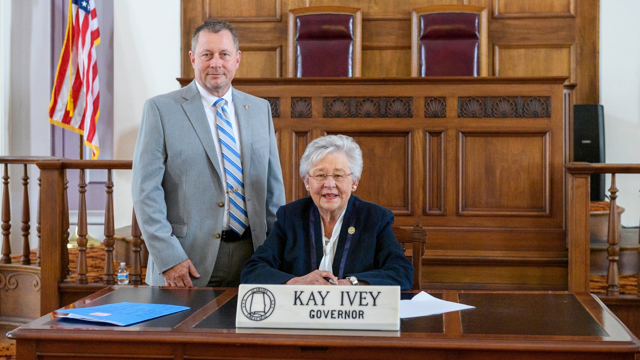 Ivey holds ceremonial signing for lifetime pistol permit bill