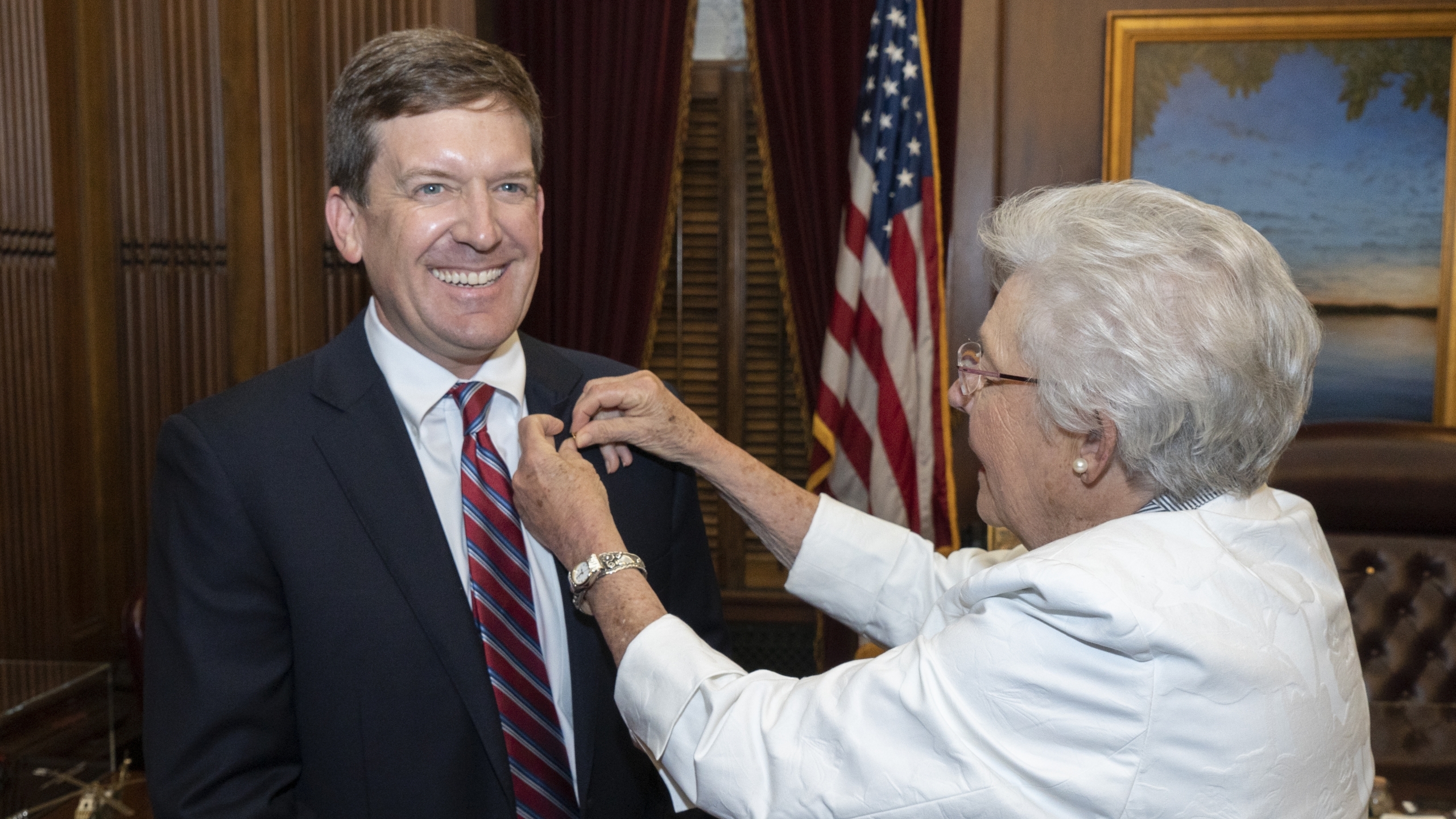 Ivey swears in Bill Poole as state finance director