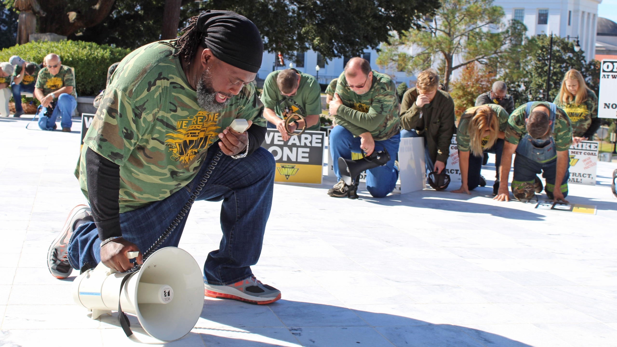 Miners demonstrate at Capitol against Trooper escorting strikebreakers