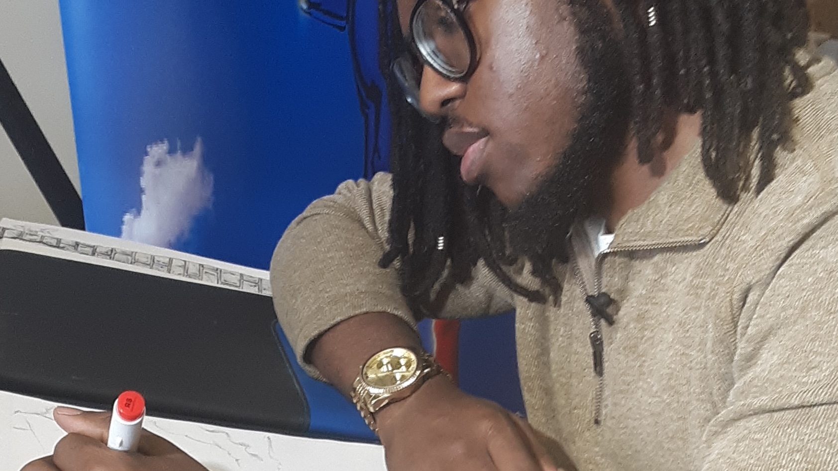 ASU student authors, illustrates superhero comic book