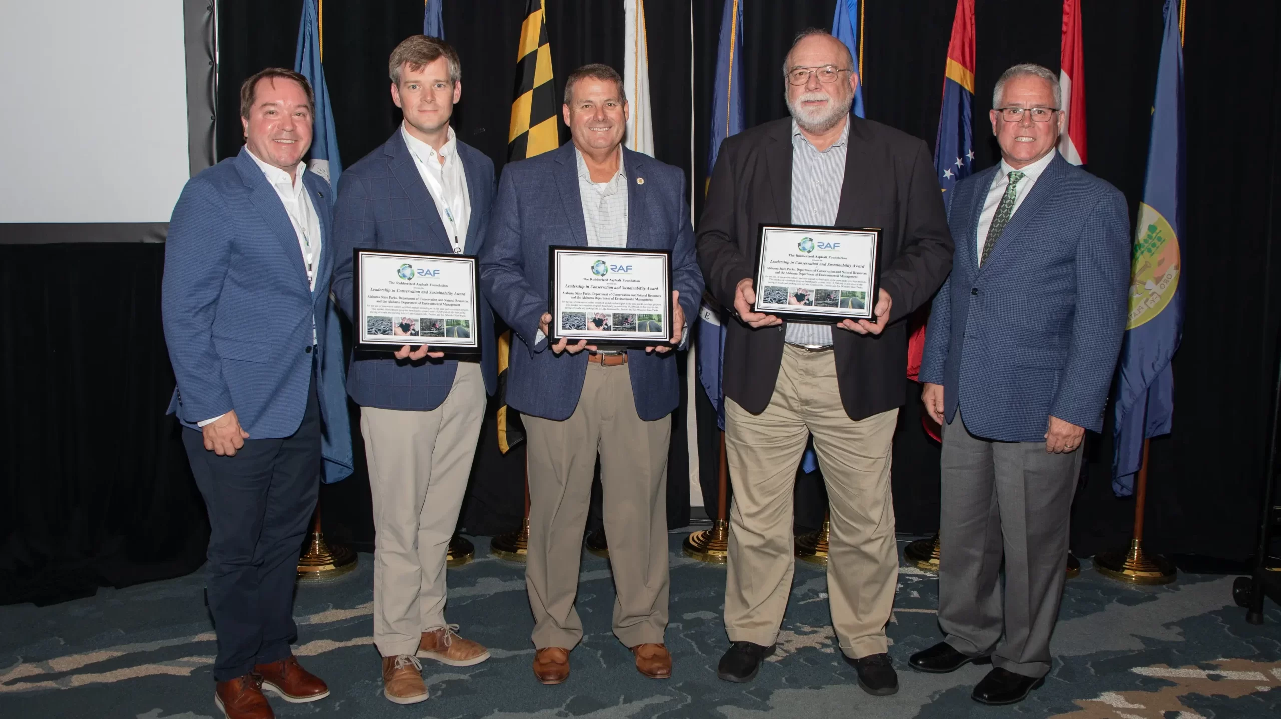 State agencies receive award for partnering to use recycled tires in road projects