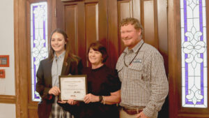Mayor Sherry Sullivan congratulates Amelia Wells on Energy Southeast Scholarship