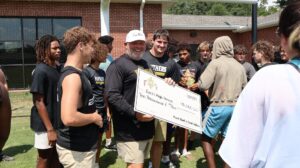 Poarch Creek Indians donate $10,000 to furnish Excel High School field house expansion