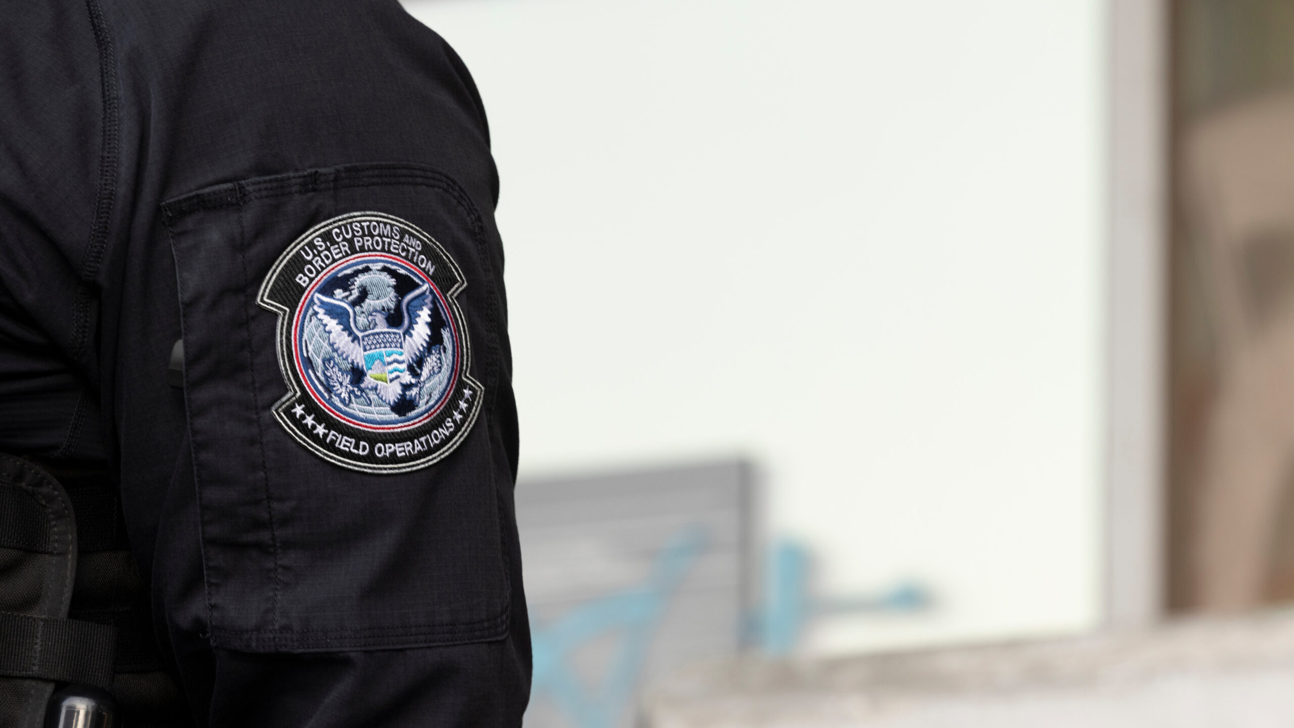 Los Angeles, California, USA - June 10, 2025: U.S. Customs and Border Protection (CBP) field officers guard a federal building during ICE deportation protests in Downtown LA.