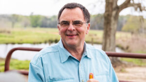 Lawmaker says group threatened to burn his home, land over dog deer hunting