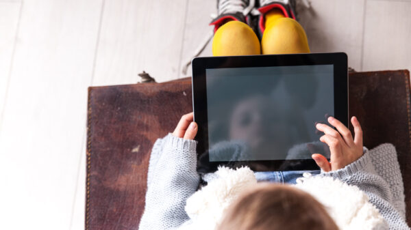 School girl with ipad tablet