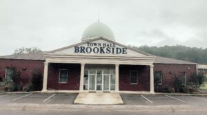 Brookside accepts settlement, including $1.5 million compensation proposal