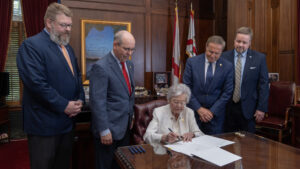 Governor signs act ensuring athletic eligibility for CHOOSE Act students