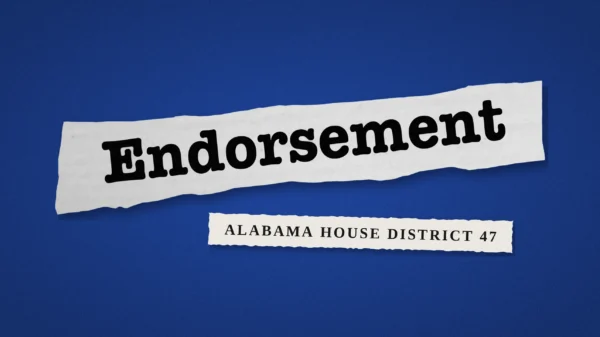 torn paper strip reading “Endorsement” on a blue background, with a tag reading “Alabama House District 47.”